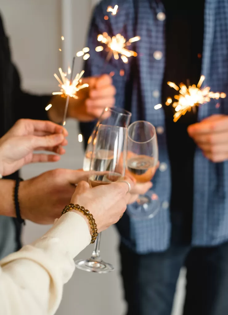 Champagne cheers and sparklers. 