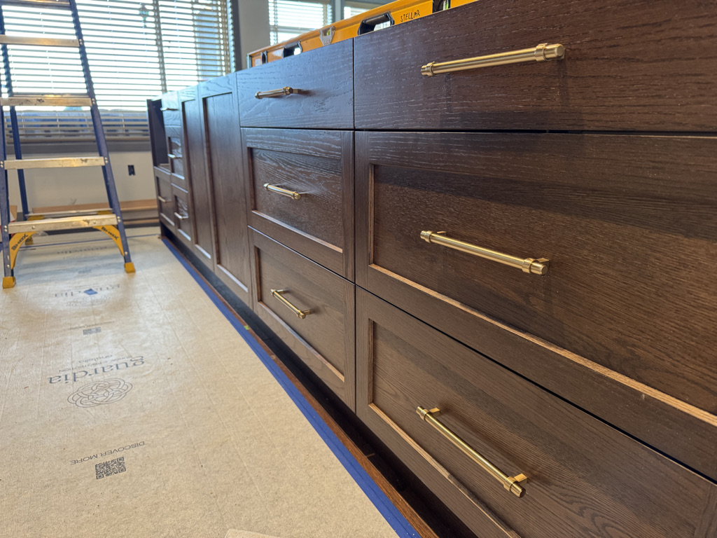 Warm wood cabinetry by Lyndsay Bragg Design